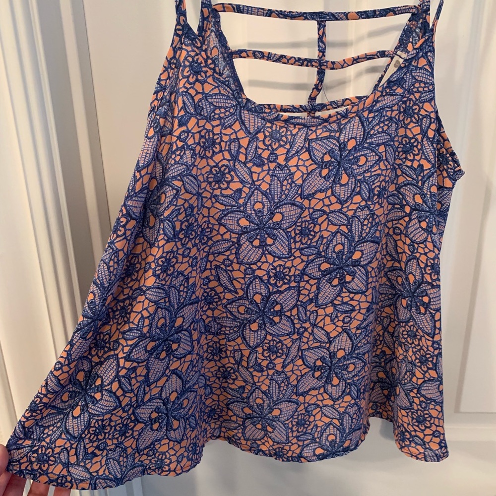Pink and blue top.